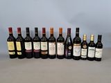 plusieurs bouteilles de vin sont alignées sur une table