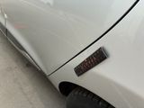 a close up of a car with a sticker on the side of it