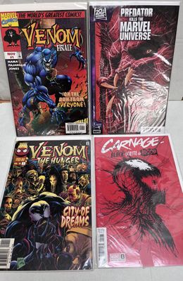a group of comics on display on a table