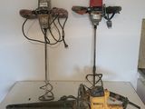two tools that are sitting on top of a table