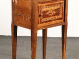 an image of a small wooden table with a drawer on it