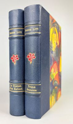 the two books are blue with gold trims on them
