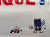 many different logos on the side of a bus
