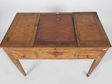 an old wooden desk with two drawers and a drawer underneath it