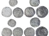 an image of a group of silver coins with a white background