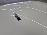 a cell phone sitting on top of a white table