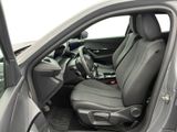 the interior of a car with the door open and the driver ' s seat down