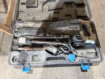 a tool case with tools in it on the floor