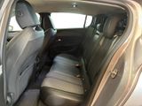 the back seats of a car with the door open and the driver ' s seat down