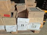 a pile of boxes sitting on a pallet in a warehouse
