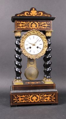 a clock that is sitting on top of a table