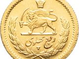 a close up of a gold coin with a lion on it
