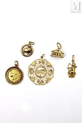 several different types of charms are shown on a white surface