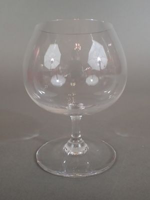 a glass that is sitting on a table