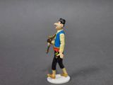 a figurine of a man holding a baseball bat
