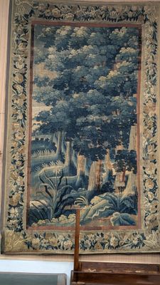 a picture of a tapestry hanging on the wall