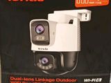 the box of the camera is open on the carpet