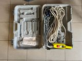 a tool box with tools in it sitting on the floor