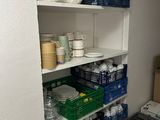 a small kitchen with a washer and dryer in it