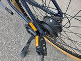 a close up view of a bicycle ' s front wheel