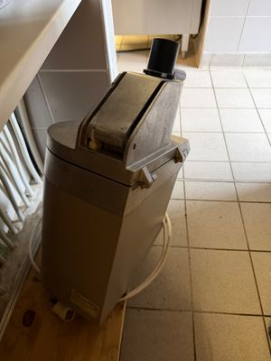 an image of a toaster sitting on a counter in a kitchen