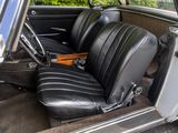 a black leather seat in the back of a car