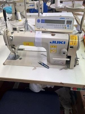 a sewing machine that is sitting on a table