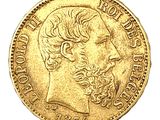 une pièce d'or sur laquelle est représenté le visage d'un homme