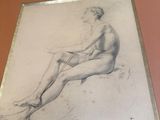une image représentant le dessin d'une femme assise sur une chaise