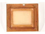 an old wooden picture frame with a picture of a cat in it