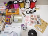 a table with a lot of crafting supplies on it