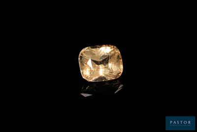 a yellow diamond on a black background