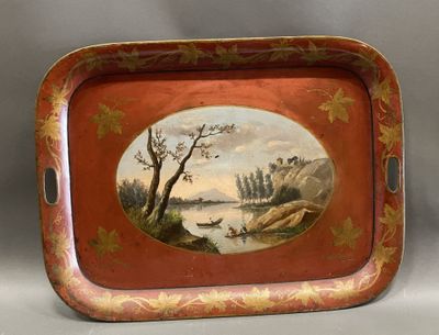 an old tray with a painting of a river scene on it