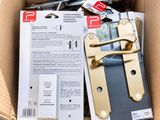 a cardboard box with a pair of handles in it