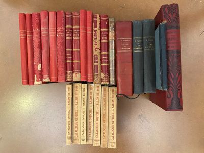 a lot of books that are sitting on a table