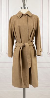 a close up of a coat on a mannequin mannequin