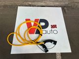 a sign that has a yellow cord attached to it