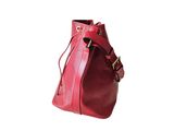 red leather bucket bag on white background with clipping for text