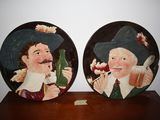 two plates with a picture of a man and a woman on them