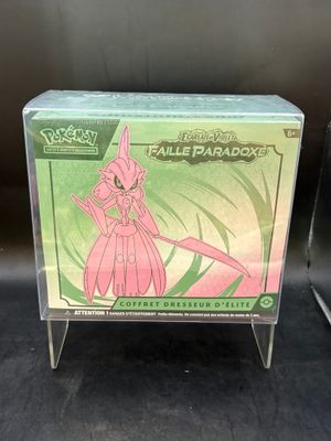 a close up of a box of pokemon cards on a table