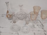 a marble table with a bunch of glassware on it