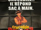 une affiche du film « Crocodile Dundee »