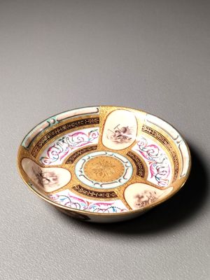 a plate with a picture of a man and a woman on it