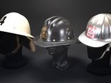 three hats that are sitting on top of a mannequin head