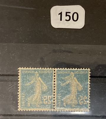 two stamps with a picture of a man and a woman on them
