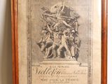 an old framed picture of a group of people on a pedestal