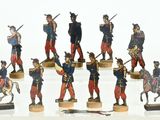 a lot of figurines of soldiers that are on display