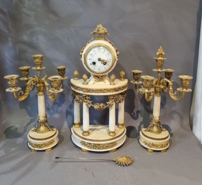 a clock that is sitting on top of a table