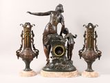 a statue of a woman and three vases on a white background