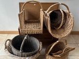 several wicker baskets sitting on a tiled floor in front of a window